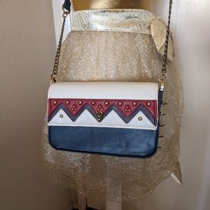 AZA GoGo crossbody bag dragon details and spikes